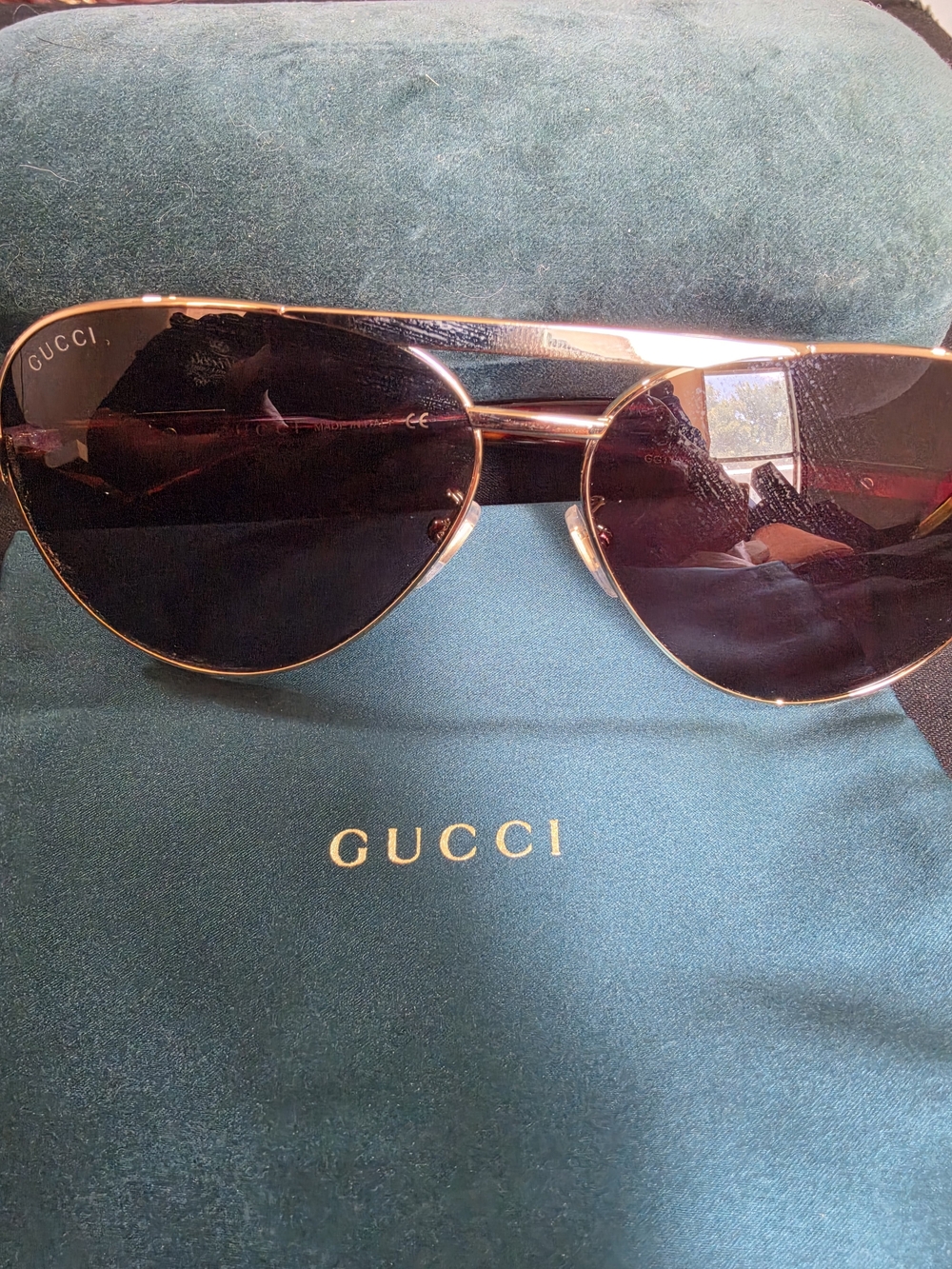 Gucci Gold Aviator Sunglasses with Dark Lenses